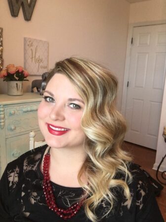 Glamorous waves are always in style and effortlessly sexy. You create this style by using a 1 Inch curling wand curling all sections in the same direction away from your face. After your curls cool, spray with a firm hairspray. Use your fingers to separate curls then follow by lightly brushing them out with a wetbrush or wide tooth comb. After your waves are set pull your hair over your shoulder ,twist the bottom, and secure with a long bobby pin. Voila! Instant Glam!