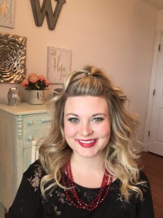 This fun Half Pony brings the party! After you complete your curls, simply make a small pony with the front section of your hair and secure it with a clear elastic. Hide the elastic by taking a bottom section from your pony and wrapping it around the elastic and securing it with a bobby pin. Take your fingers and loosen your style to how you like!! Now you are ready for a fun and flirty Christmas Party!