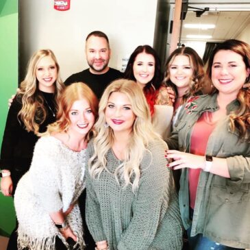 Whitney Evans Beauty team members smiling together in 2018