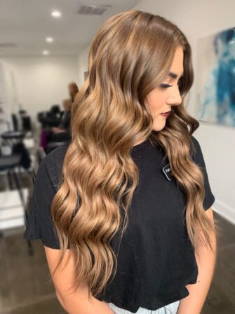 Brown hair with length and volume